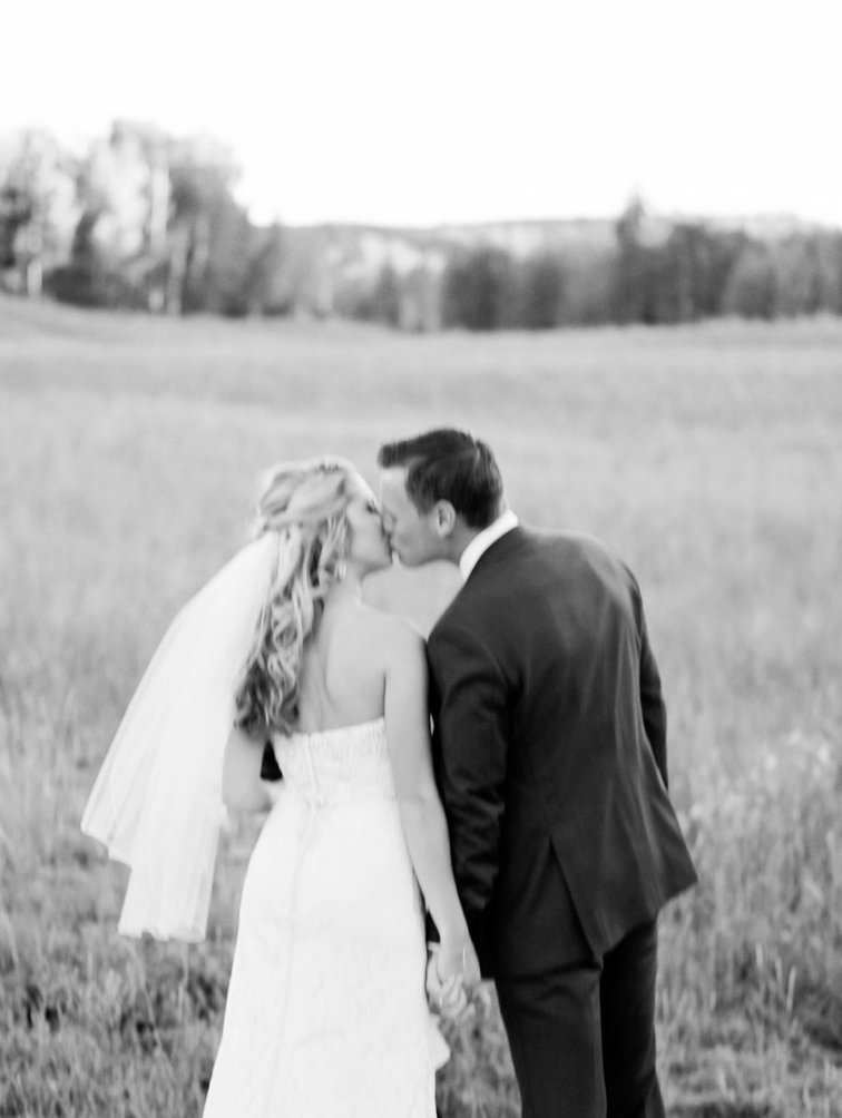 Ritz Carlton Bachelor Gulch Wedding: Black and White Image Of Bride And Groom Kissing