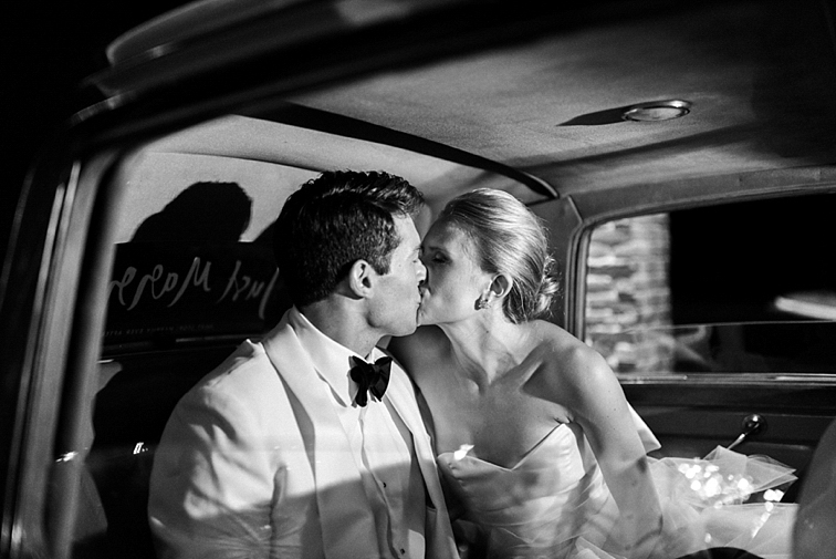 Kiss in the Wedding Car - Denver Wedding Photos, Cherry Hills Country Club