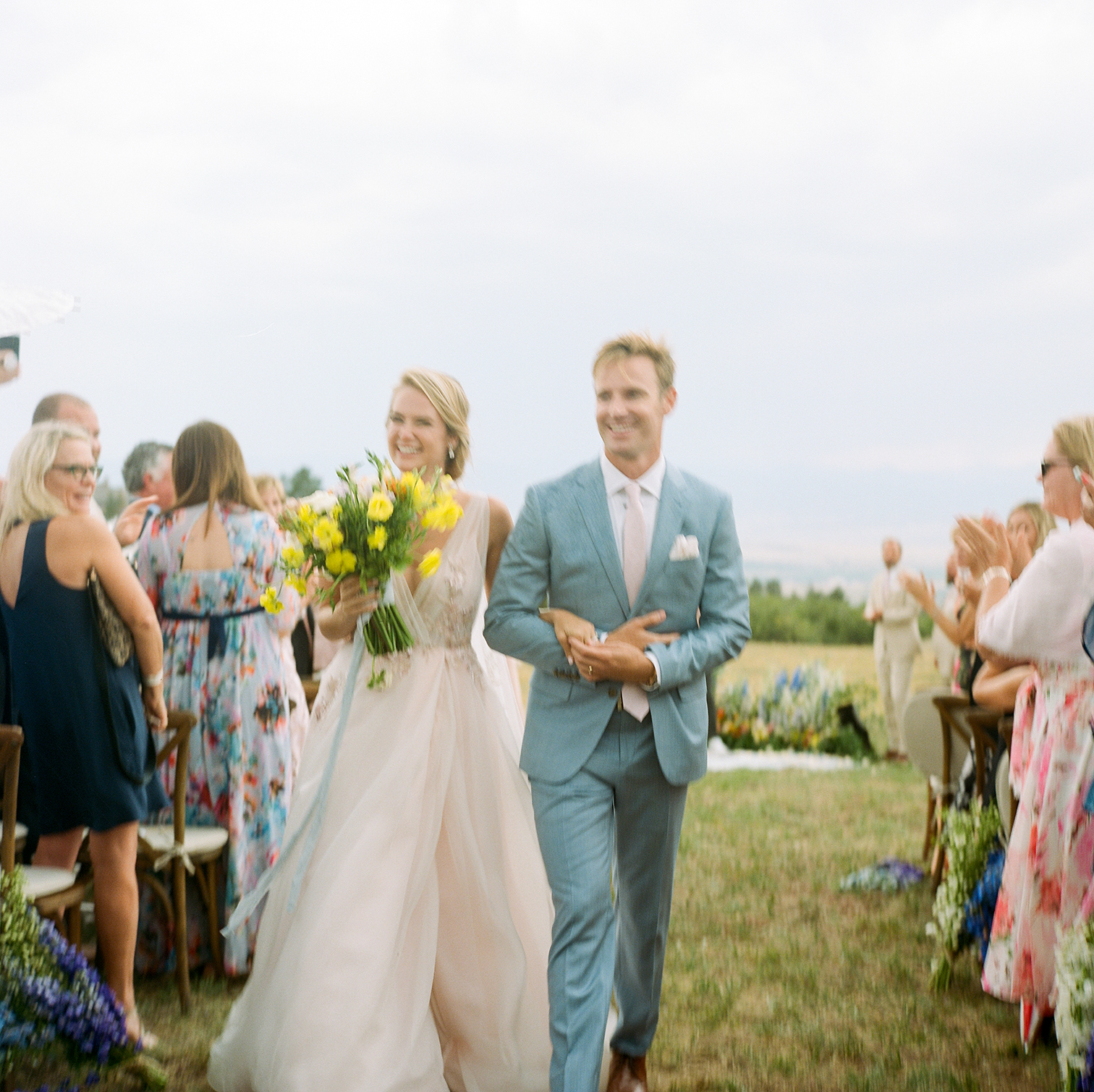 Colorado Wedding Photographers, Mountain Ceremonies, Bride and Groom Walking to Reception