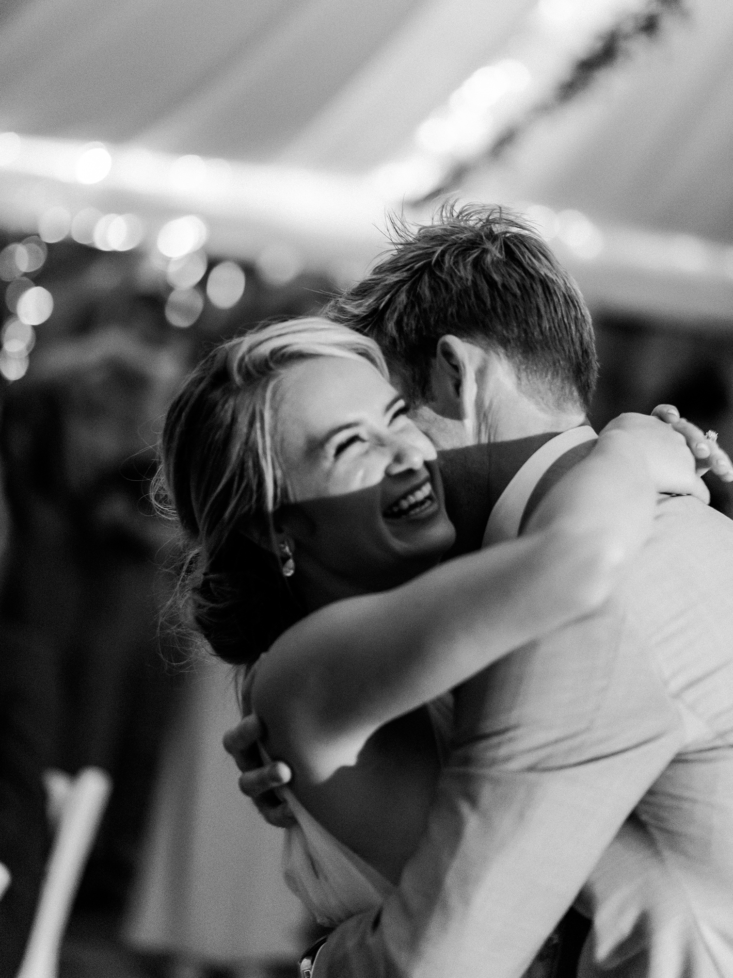 Wedding Photographers Colorado, Best Creative Wedding Photographers in Colorado, Bride Laughing During Dances, Black and White Wedding Photos