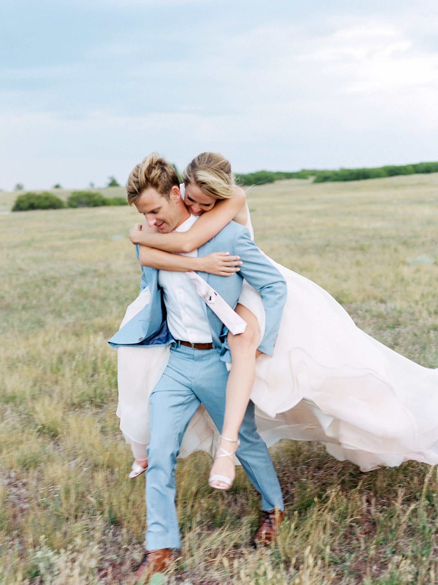 Wedding Photographers Colorado, Best Photography, Denver Wedding Photos, Groom Carrying Bride in Mountains, Fine Art film Photographers in Colorado