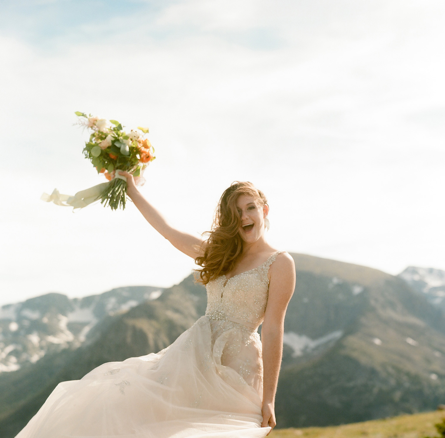 Aspen wedding photography, bride on mountains, colorful mountain photos, bride smiling