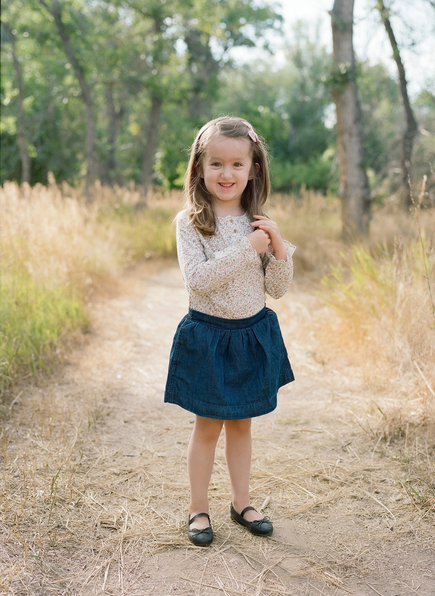 Snowmass Colorado family photographer for outdoor mountain session; portraits of little girl.