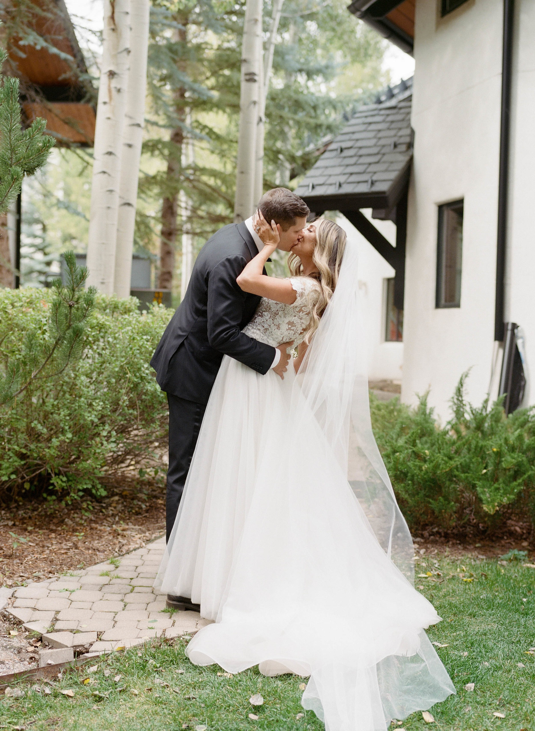 Vail Photographers, Vail Chapel, Bride and Groom Kissing